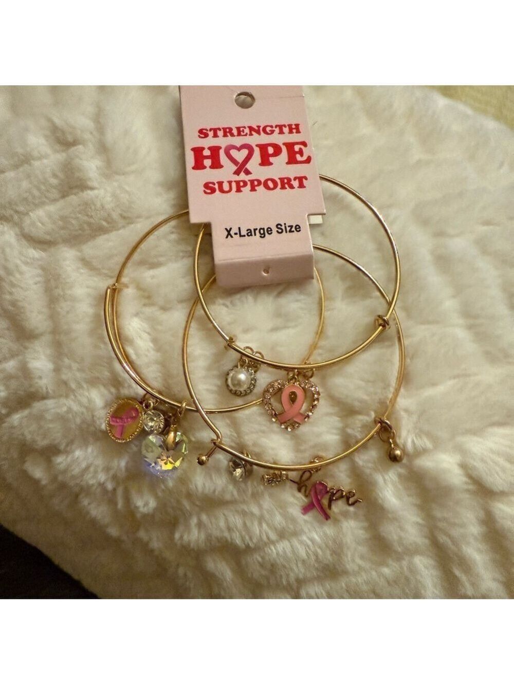 Gold and Pink Charm Bracelets